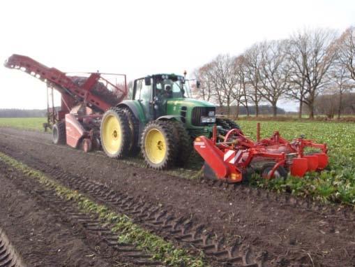 swath = slower - fewer blockages Potato harvester controls tractor