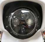 With the motorcycle positioned up right measure the distance from the ground to the center of the high beam bulb. Take that measurement and subtract 2 inches from it.