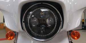The headlight is aligned when the hot spot of the light beam is centered over the intersection of the two lines. Verify the headlight s alignment and adjust it if necessary. Refer to PIC 28 and 29.