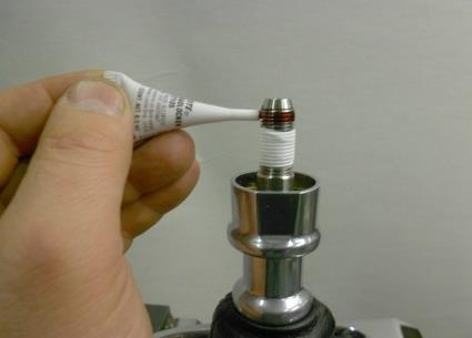 Apply the included LOCTITE 271 thread lock compound to the threaded portion above the Teflon tape. 54.
