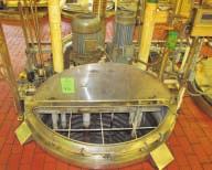 Tank has a Floor Mounted Bridge, with an Angle Mounted Lightnin Mixer, Model Number AR XLQ 2000, 2 HP, No Seal on Shaft, Shaft has Two Sets of 3 Pitch Paddle Turbine Blades 1 1000 GALLON 304