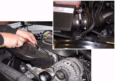Remove clip and radiator hose from radiator. Clip Ground Strap 2.
