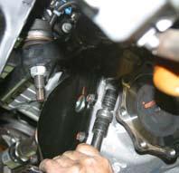 (See Photo # 14) Photo # 13 19. Remove the driver side differential bolts using a 15mm & 18mm socket.