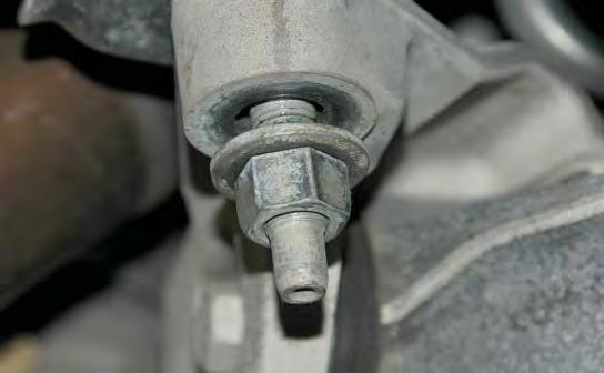 Using a 21mm socket wrench, loosen the four front sub-frame nuts shown. Sub-frame nuts 60.