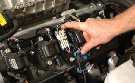 Connect the oxygen sensor coil pack plugs in their original location.