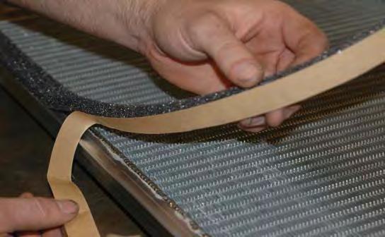 Start the Heat exchanger installation by applying the adhesive backed foam strip to the back side of the heat
