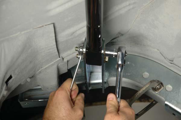 Tighten the 3/8 upper crossmember mounting hardware to 35 lb-ft. 23.
