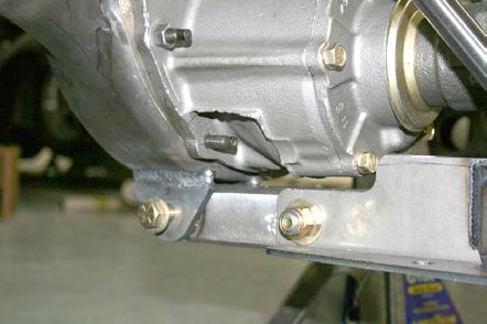 The slider has preassembled with Teflon bushings and has been installed in the Torque Arm to check for proper fit. We use anti-seize on the threads to prevent galling.