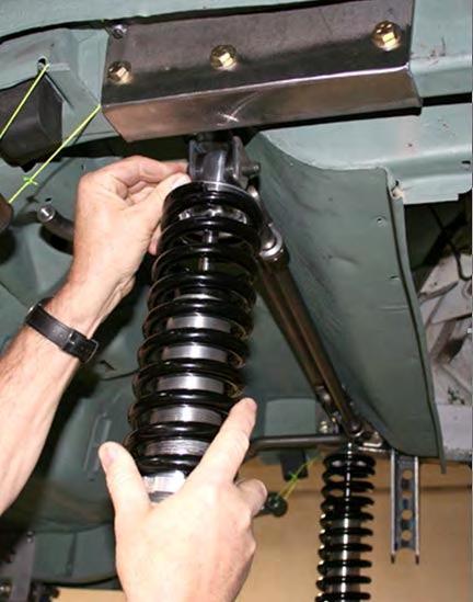 Install the tubes with the right hand rod ends on the inside of the top brackets using the ½ by 8 inch bolt, washers, 5.2 inch spacer in between rod ends and Nylock nut.