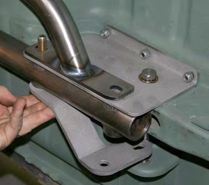 Push the two rear connector ½ by 3½ inch bolts through the front holes