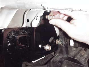 10. Tighten all the tie down bolts on each side of the