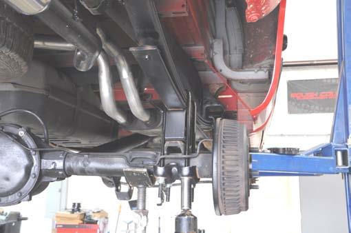block to the front). See Photo 5. 9. Install the supplied ubolts using a 22mm socket.