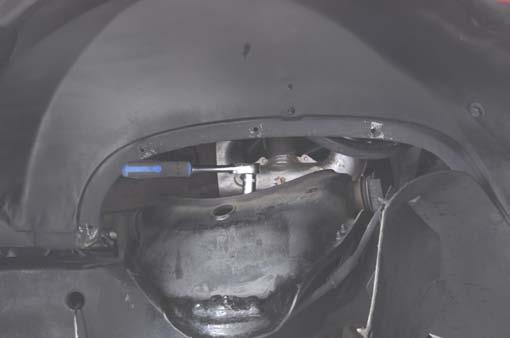 Using a 3/8 Allen, remove the brake caliper bolts and remove the brake caliper.