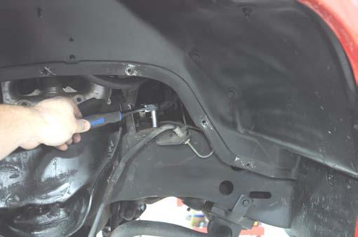 Install the tie rod end in the spindle and tighten using a