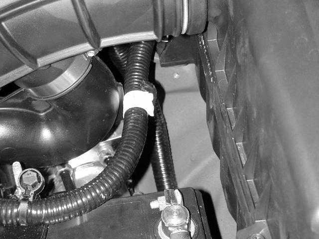Breather Hose Hose Clamp e) Unclip the wiring harness from the inlet air hose f) Loosen