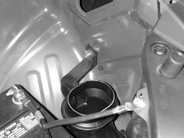 Slide Battery Remove g) Remove the remaining bolt securing the air box to the chassis.
