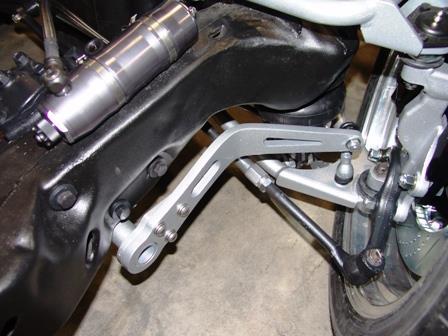 7. Bolt the sway bar arm to the bar using 3/8 x 1 Button head screws with flat washers and lock washers. 8.