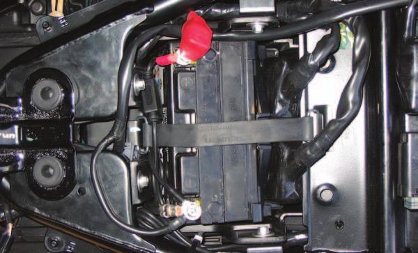 3 Use the supplied zip tie to secure the PCV harness to the frame (Fig. A). FIG.A FIG.