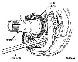 NOTE: The rear wheel bearing inner cone and roller (1244) is located behind the hub oil seal.