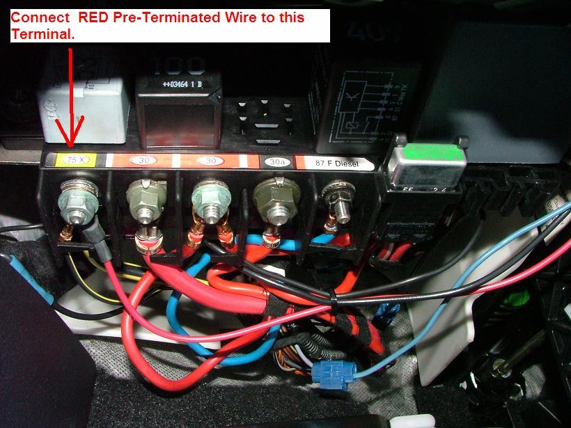 Connect the red pre-terminated wire to terminal 75x (black