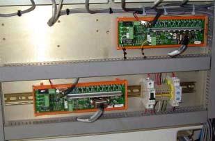 8. Use the label (from kit) to label the IPC Board as "Light." Once installed and labeled, both IPC Boards appear as follows. Figure 63: Light and Dark IPC Boards Installing the Ink I/O Board 1.