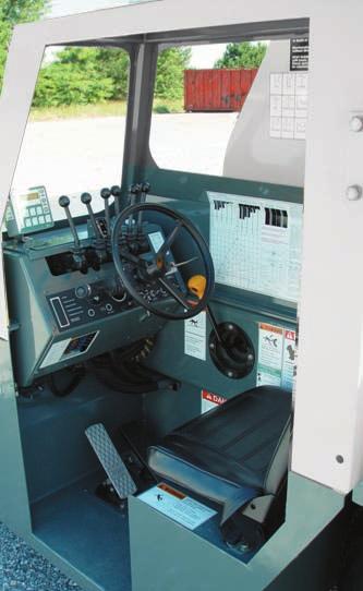 An optional enclosed cab with hinged door, heater, and defroster is