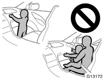 Do not allow a child to stand up, or to kneel on the front passenger seat. The front airbag inflates with considerable speed and force; the child may be killed or seriously injured.