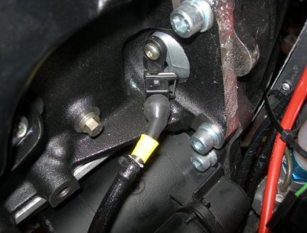 to lock the plug in place. Most sender plugs are mounted in a similar way with a spring retaining clip.