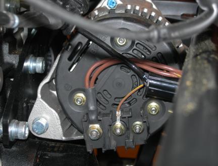 21 Connect the large brown wires (two wires into one eyelet) to the left connection on the back of the alternator should be marked (B) (Fig7.