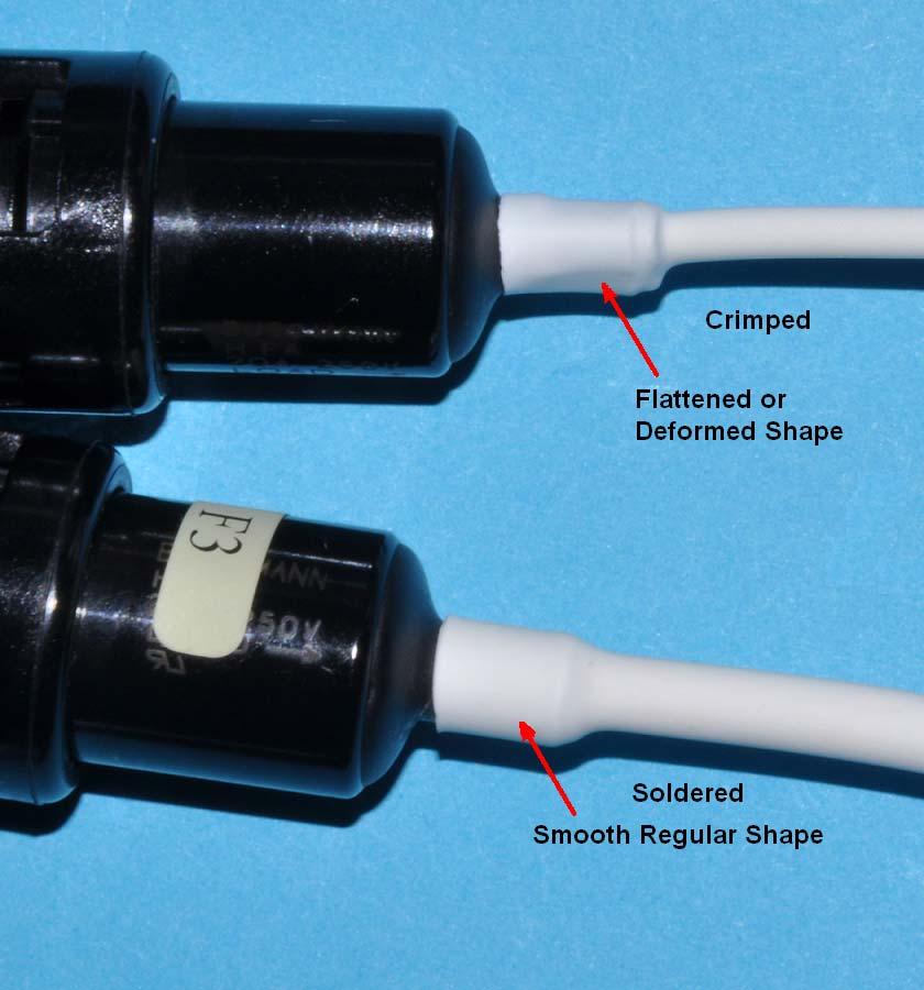 4. Remove the P clamp from the engine and fuse holder. 5. Inspect both ends of the fuse holder termination and determine if the termination is crimp or solder as shown in Figure 1. < 0.200 Inches > 0.