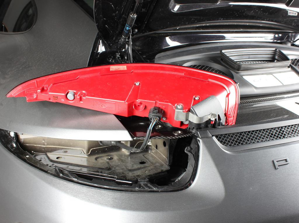 3. Carefully pull the tail lights out of the chassis, disconnect the tail lights electrical connectors and remove the tail lights off the vehicle, on both
