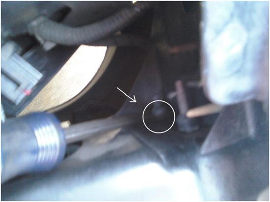 (One is located directly under the bolt from step 5 and the other is closer to the center of the car directly behind the headlight.
