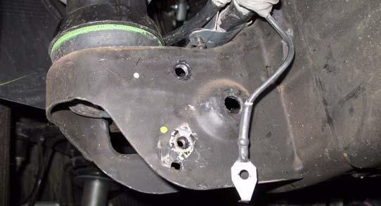 Route parking brake cable through kit bracket (parking brake) and connect front and rear brake cables