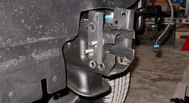 r flap with push clips into corresponding holes on core support. a.