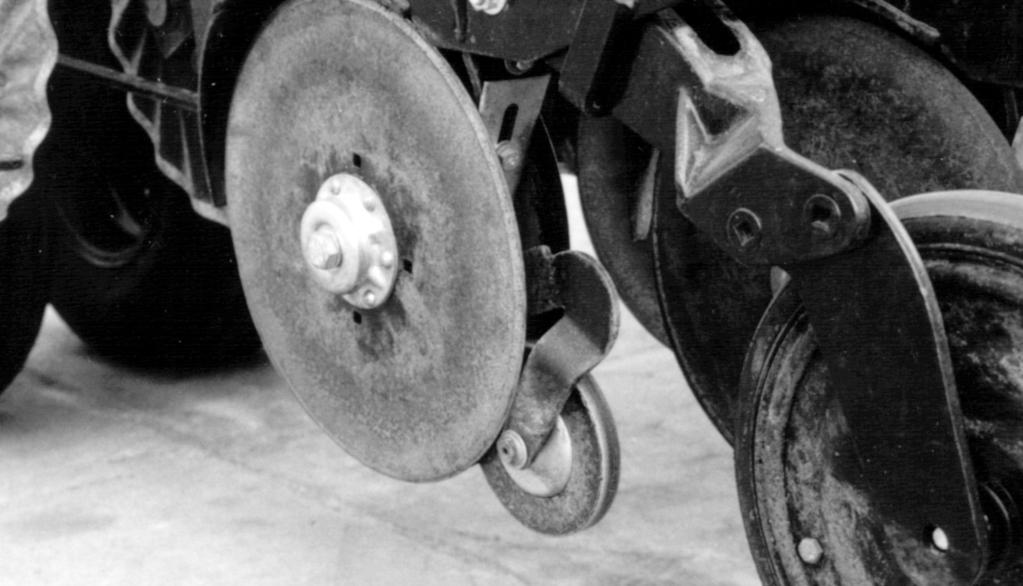 Section 6 Attachments Section 6 Attachments Seed-Lok Firming Wheels The optional, spring-loaded Seed-Lok firming wheels press the seed directly into the bottom of the seed bed.