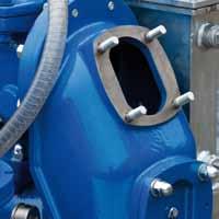 the volute is filled with water, the centrifugal pump builds up pressure,