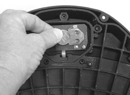 Remove the five screws on the battery cover plate located on the underside of the foot-pedal.