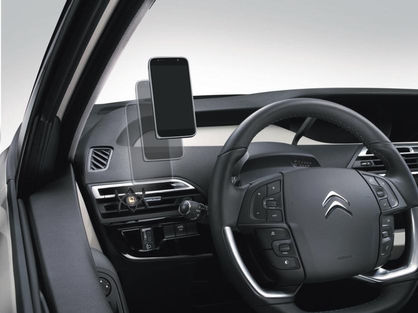 3 1 2 MOBILE CONNECTION Stay safely connected with the outside world with CITROËN mobile accessories. Hands-free kits, a telephone holder and a charger make using your smartphone in your vehicle easy.