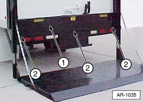 Chain Adjustment Procedure for Above Bed RailTrac Models 2. Remove three housing cover screws (2) and then remove housing cover (1). Above Bed RailTrac. Remove three housing cover screws (2) to remove housing cover (1).