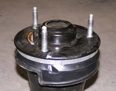 Plate () Locator Compressed coil springs can expand violently causing serious personal injury.