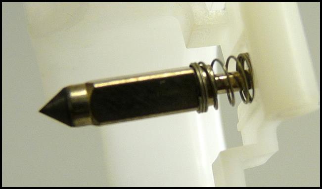 for inlet needle and orientation of spring