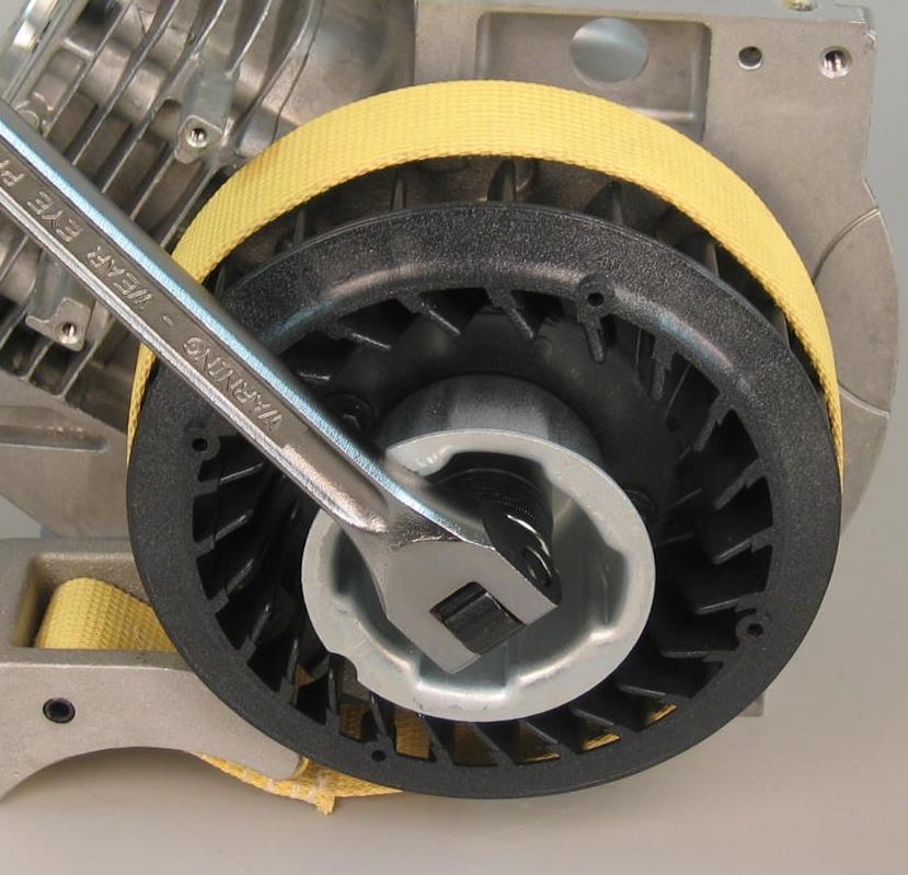 Remove Flywheel Nut Use 21 mm socket, breaker bar and 19433