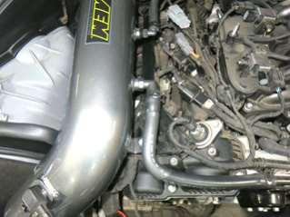 i. Install the AEM intake tube into the coupler while
