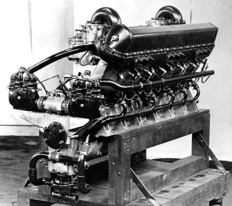 The valve and head was of Packard design, but the four plugs per cylinder were no doubt Engineering Division instigated. The Spur-Geared Version of the Duesenberg Model H on a Test Stand During WWI.