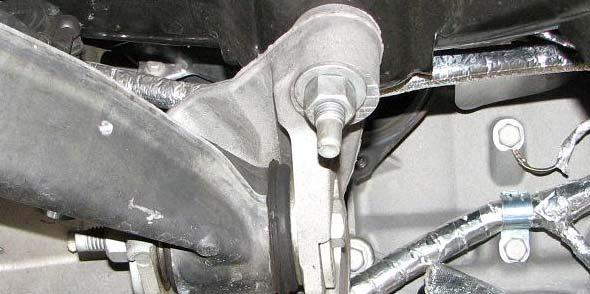 Remove the plastic clamp holding the power steering lines to the steering rack. 78.