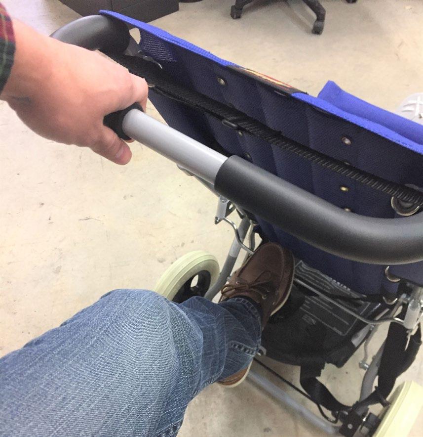 Folding and Carrying the Lightning 9.5 Step One: Grasp the push chair handle(s).