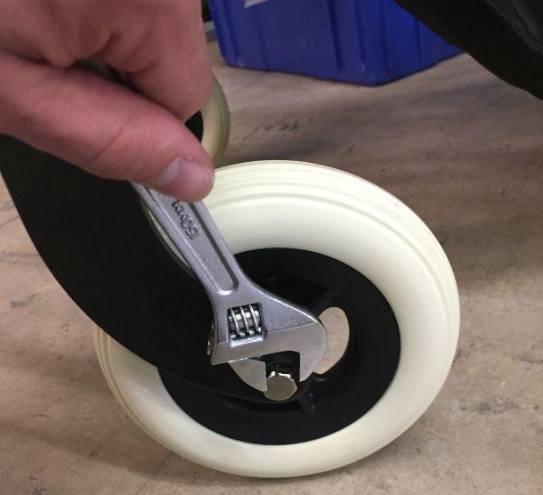 outside of the wheel/wheel caster, insert the shoulder bolt through the wheel to the inside wheel