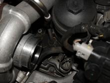 Locate the radiator drain on the lower driver side of the radiator