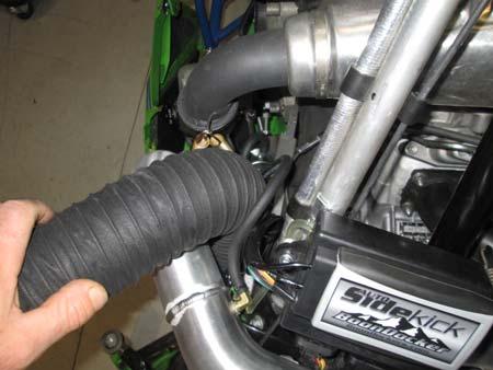 Remove the factory air intake plenum 52.
