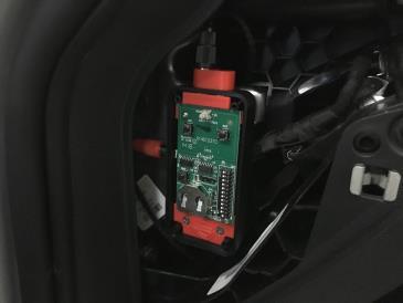 Keep pressure on the module for 30 seconds to help the adhesive set. 3. Reconnect the vehicles battery and test the Garage Control button.